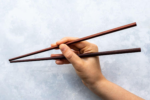 how to eat rice with chopsticks