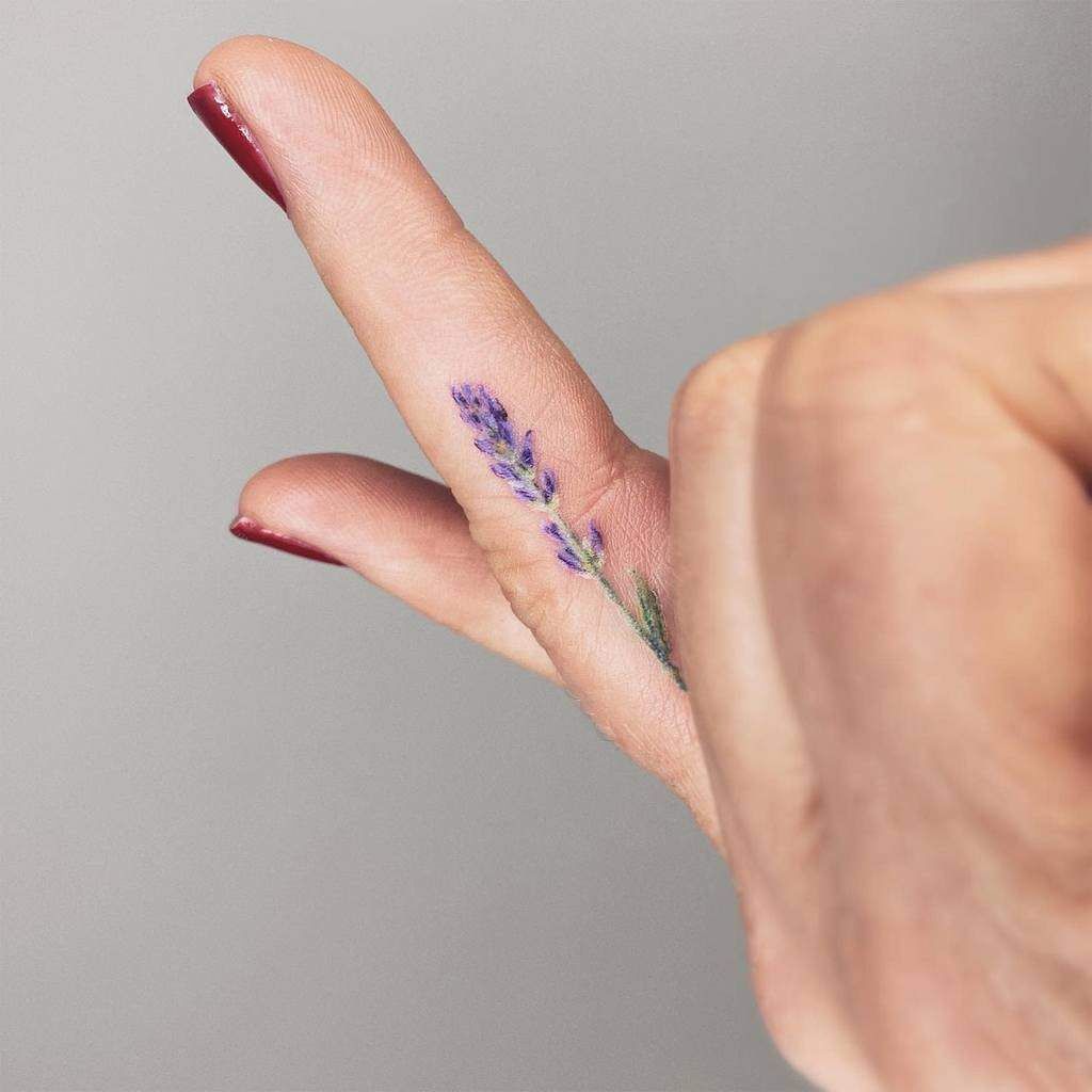 finger tattoos for women - blue levander